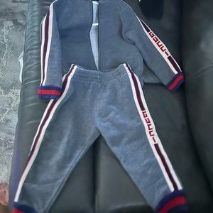 Toddler boy gray Gucci jogging suit gentle wear